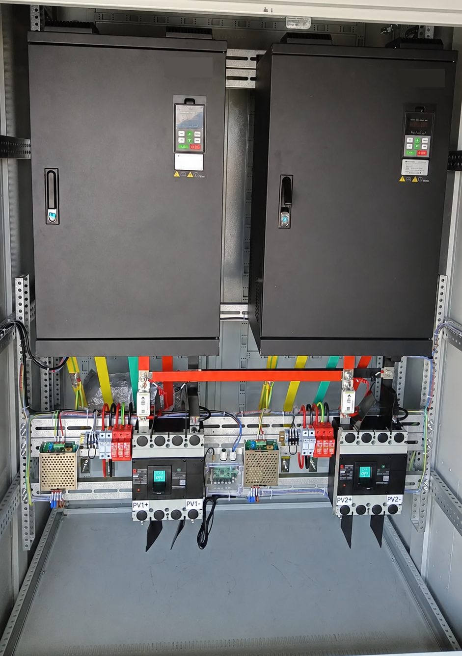 Solar pump inverter cabinet with two drives, DC breakers and surge protection